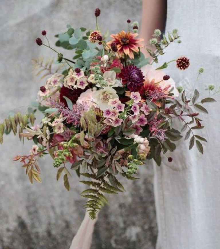 Bride holding country garden style bouquet