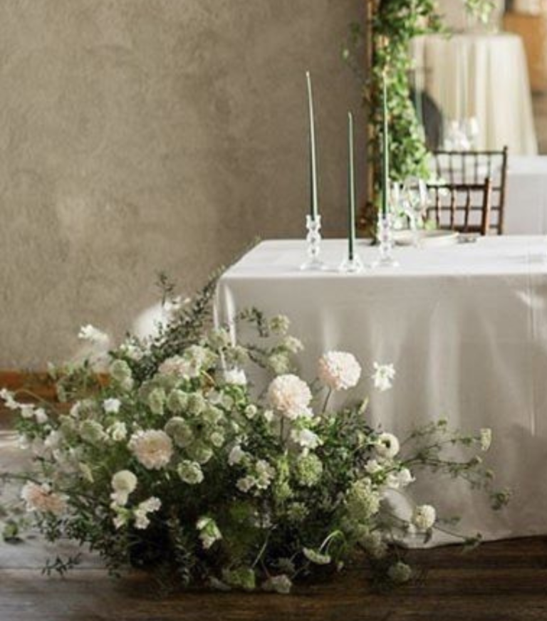 Wedding reception table with meadow flowers